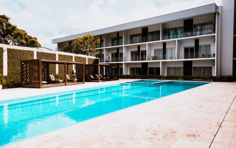 Urban Flats Furnished Apartments in San Jose Costa Rica Pool View 2 1 scaled 1 8313240c