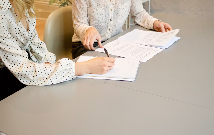 people writing on the table